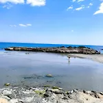 At Cala Capitn Beach, *