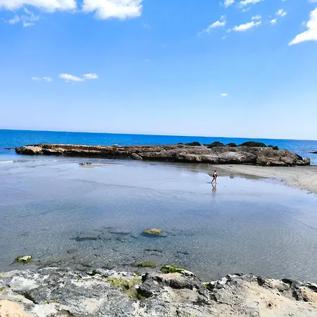 At Cala Capitn Beach, *